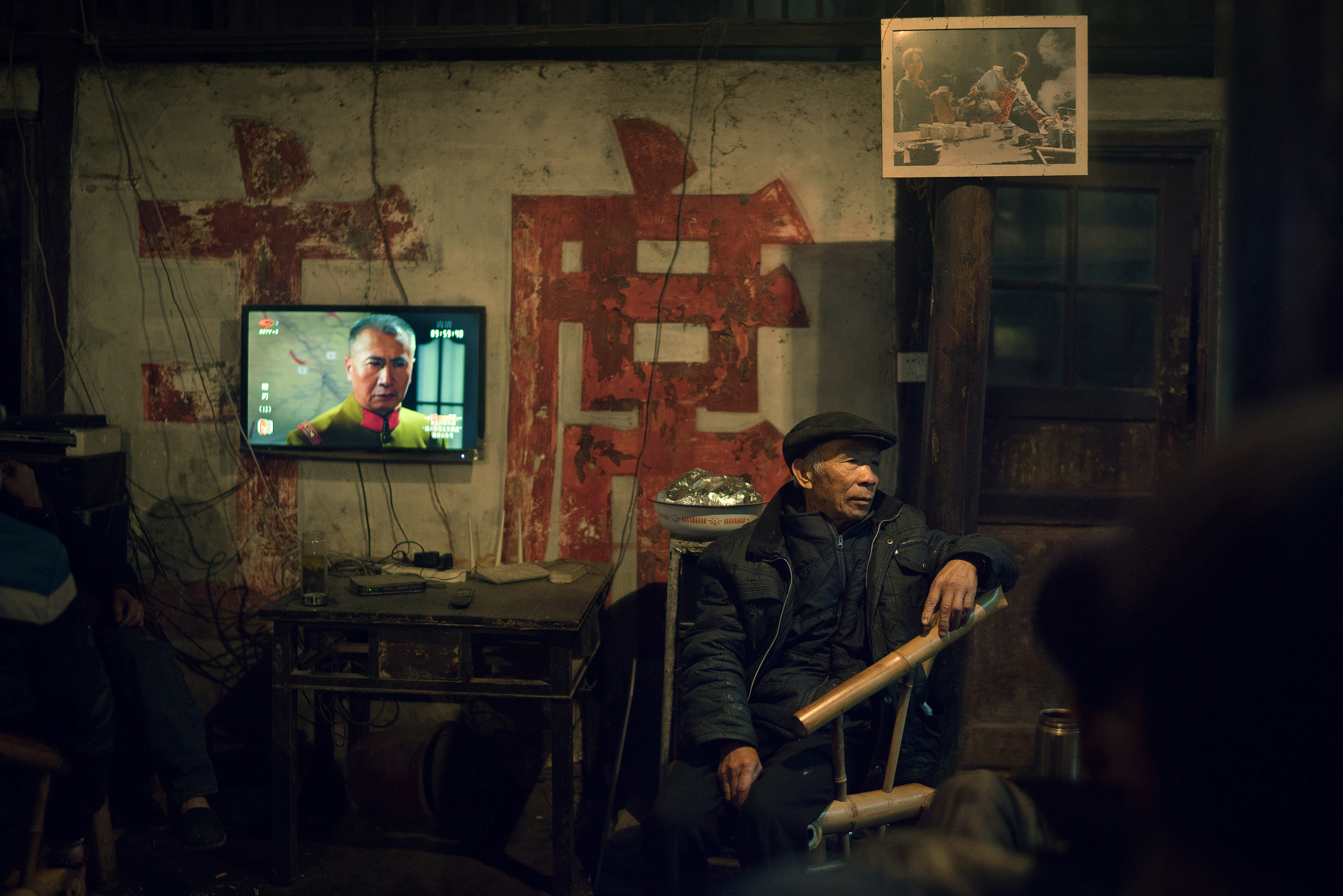 The Chinese community and tea has a symbiotic relationship, a synonymous connection dating back ages ago. There's a saying "If you don't drink tea, you are not Chinese". Taken in an old Chinese Tea House in Pencheng District, Chengdu, China, which was founded around 150 years ago, this portfolio reflects the ancient tradition of Chinese teahouses, much like the modern cafes that mushroomed over our cities now. It still retains its old world charm, frequented daily by the older generation brought up in the olden era of China. These portraits, a reflection of the nation history, offer a last look at a quickly disappearing part of the nation's cultures, due mainly to China's focus on its economic and modernisation policies. The modern generation now frequents Starbucks for their cuppa, these images are a portrayal of how life used to be, and still is, for these older generation ......... their very own "Starbucks" in a world that has stood the test of time.