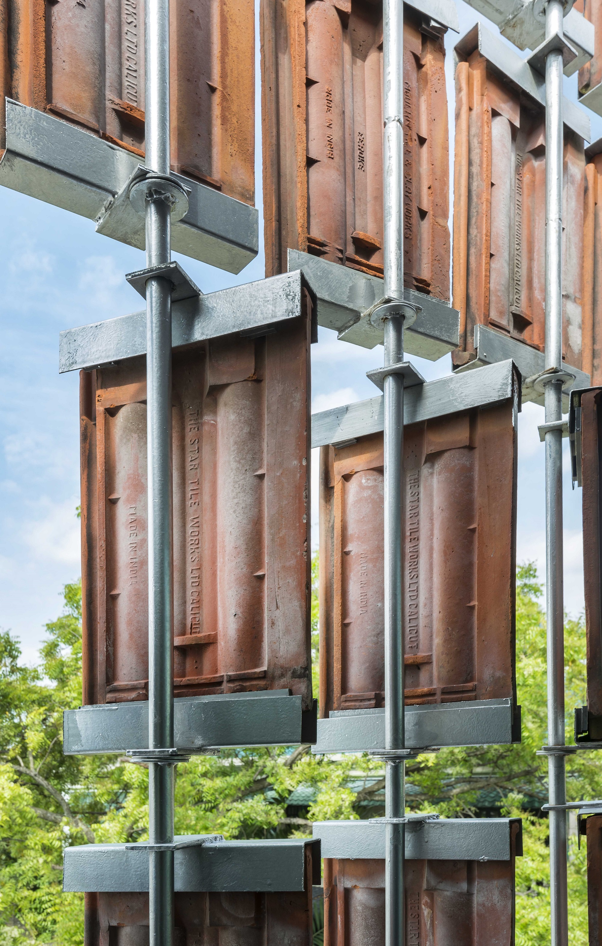 This house  in PJ brilliantly repurposes roof tiles into a 