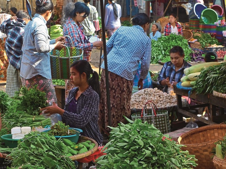 Piles of fresh greens at the market