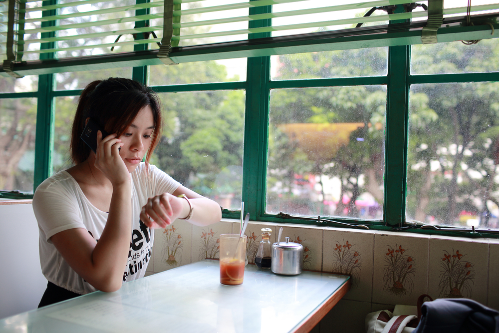 girl waiting at cafe