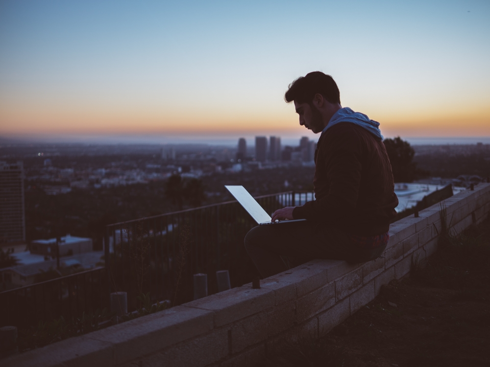 laptop user on roof