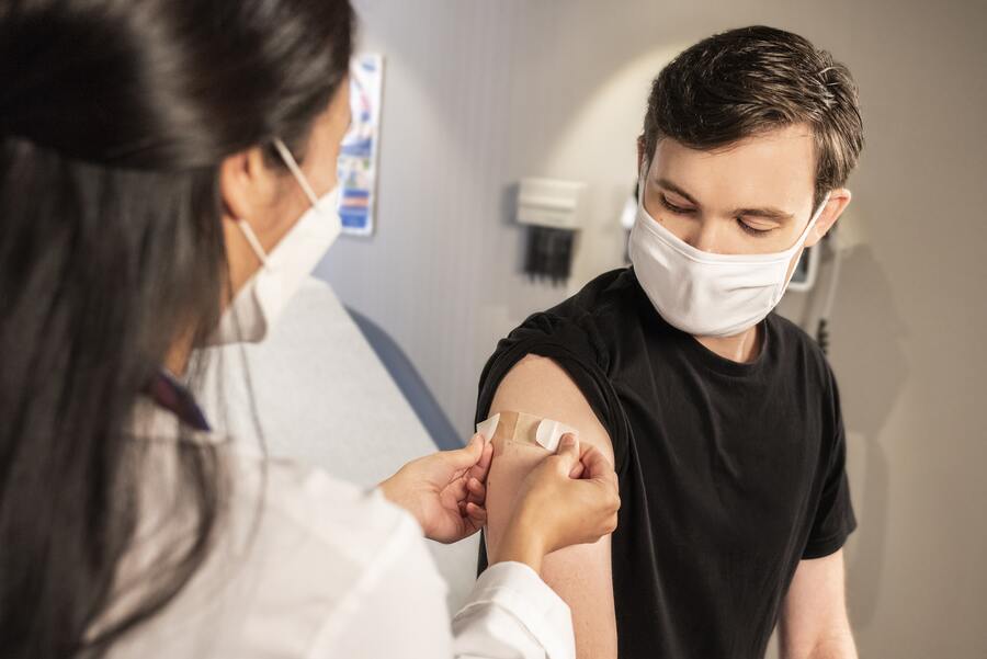 teenager receiving vaccinations