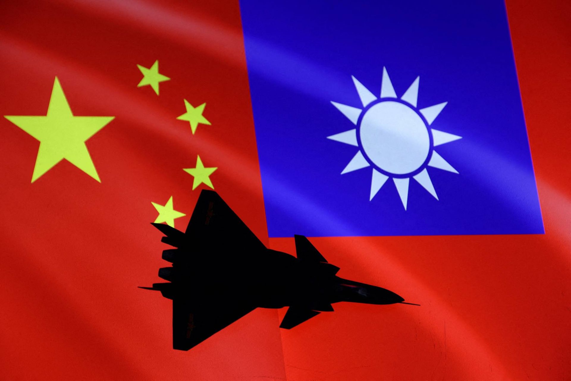 FILE PHOTO Illustration shows airplane, Chinese and Taiwanese flags